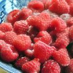 A bowl of fresh picked raspberries